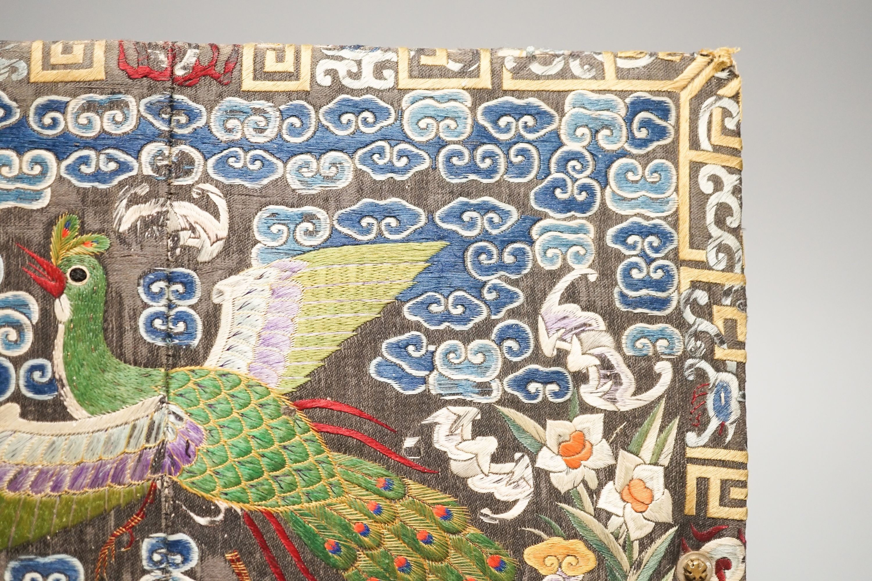 A Chinese embroidered rank badge, late Qing dynasty, later mounted